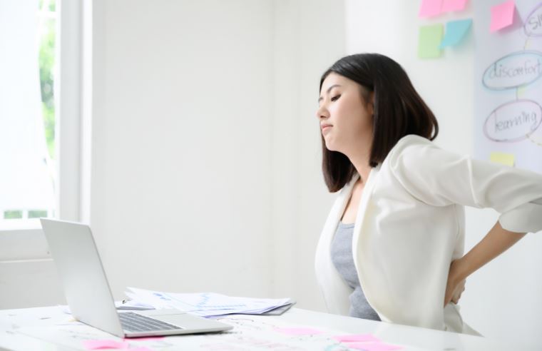 Ngồi lâu bị đau lưng là do nguyên nhân gì? Cách khắc phục?
